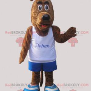 Mascotte cane marrone vestito con abiti sportivi -