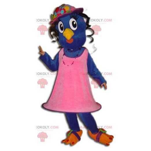 Mascote pássaro azul e amarelo com um vestido rosa -
