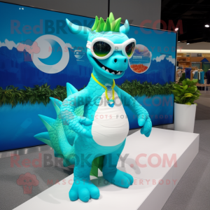 Cyan Dragon mascot costume character dressed with a Swimwear and Eyeglasses