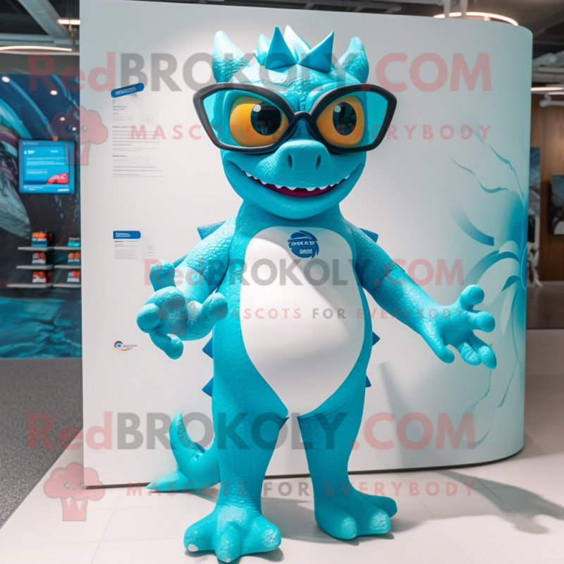 Cyan Dragon mascot costume character dressed with a Swimwear and Eyeglasses Cyan Dragon mascot costume character dressed with a Swimwear and Eyeglasses