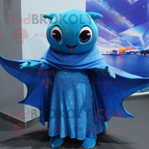 Blue Manta Ray mascot costume character dressed with a Blouse and Scarves