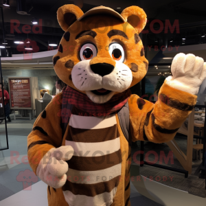 Brown Tiger mascot costume character dressed with a Flannel Shirt and Mittens