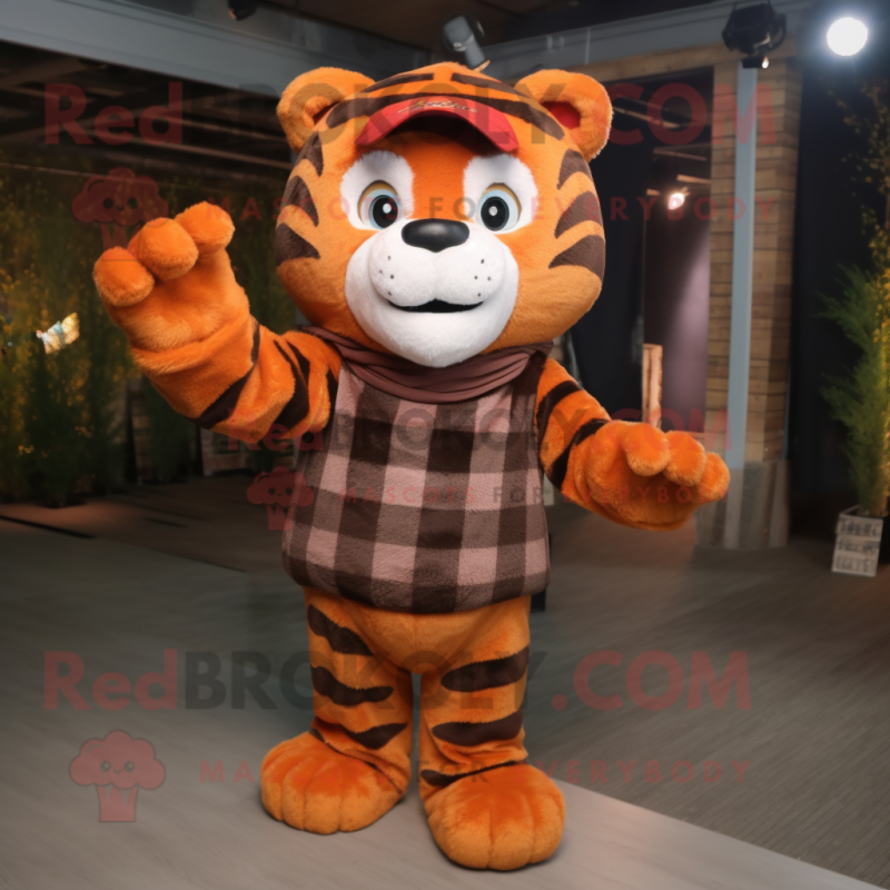 Brown Tiger mascot costume character dressed with a Flannel Shirt and Mittens