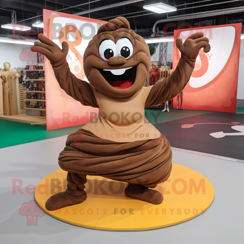 Brown Contortionist mascot costume character dressed with a Skirt and Shoe laces Brown Contortionist mascot costume character dressed with a Skirt and Shoe laces