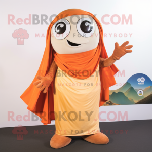 Beige Orange mascot costume character dressed with a Graphic Tee and Shawls