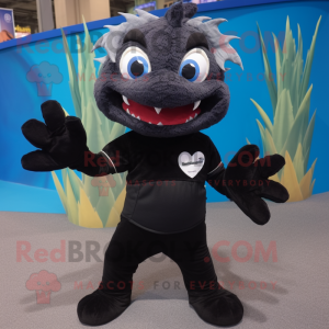 Black Barracuda mascot costume character dressed with a Dress Pants and Mittens