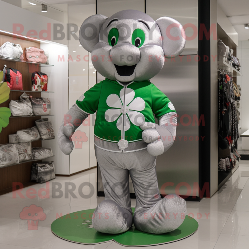 Silver Four Leaf Clover mascot costume character dressed with a Polo Shirt and Coin purses
