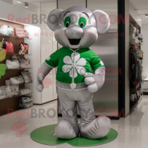 Silver Four Leaf Clover mascot costume character dressed with a Polo Shirt and Coin purses