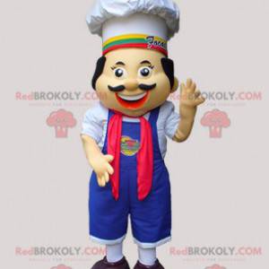 Mascotte de chef cuisinier avec un tablier et une toque -