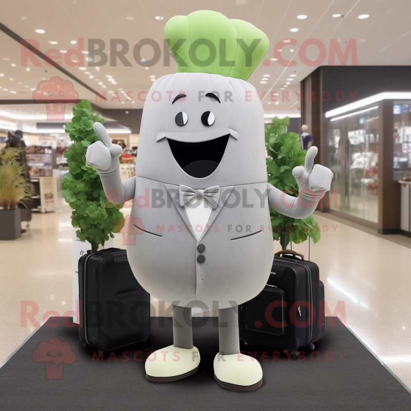 Gray Radish mascot costume character dressed with a Evening Gown and Briefcases