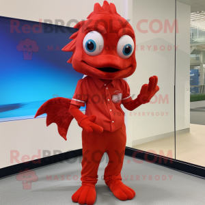 Red Betta Fish mascot costume character dressed with a Poplin Shirt and Belts