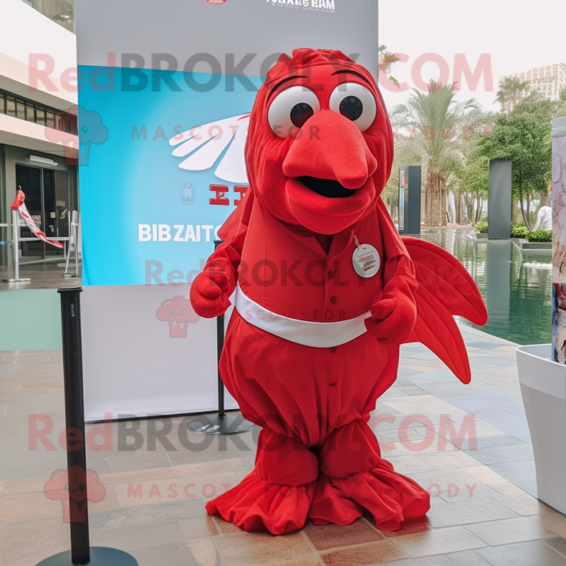 Red Betta Fish mascot costume character dressed with a Poplin Shirt and Belts