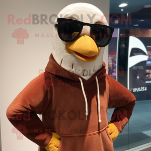 Brown Gull mascot costume character dressed with a Hoodie and Sunglasses