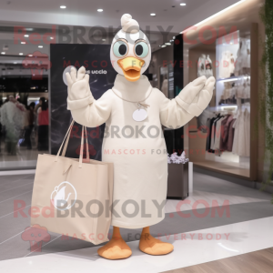 Beige Swan mascot costume character dressed with a Jumpsuit and Tote bags