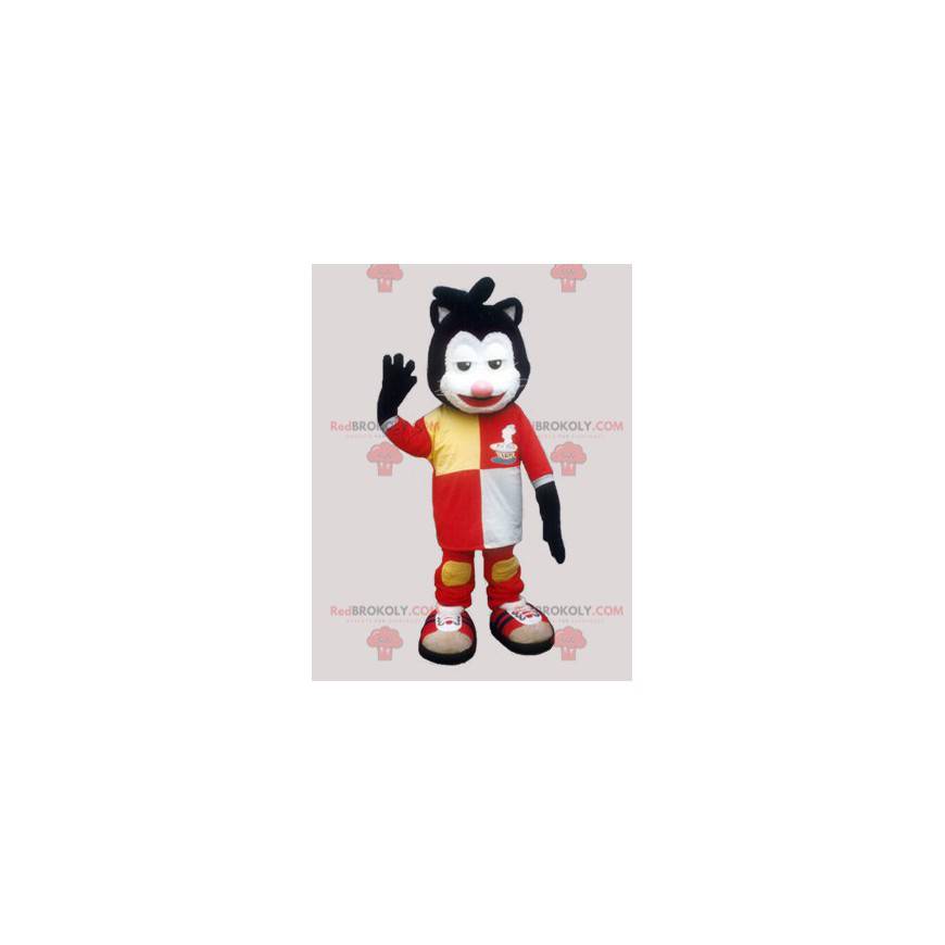 Zwart-witte kat mascotte met een zeer kleurrijke outfit -
