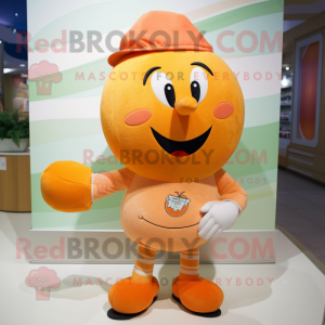 Peach Squash mascot costume character dressed with a Jeggings and Brooches
