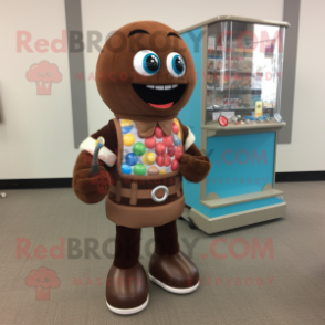 Brown Gumball Machine mascot costume character dressed with a Rash Guard and Shoe clips