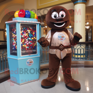 Brown Gumball Machine mascot costume character dressed with a Rash Guard and Shoe clips