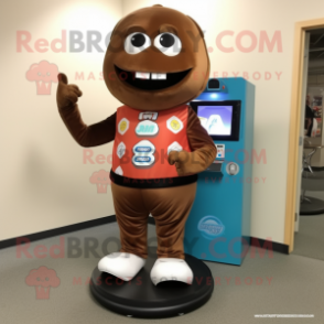 Brown Gumball Machine mascot costume character dressed with a Rash Guard and Shoe clips