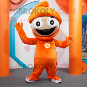 Orange Acrobat mascot costume character dressed with a Hoodie and Berets