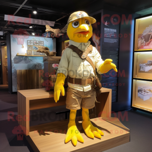 Gold Pigeon mascot costume character dressed with a Cargo Shorts and Bracelets
