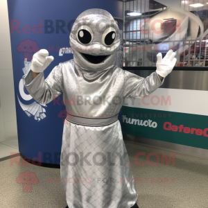Silver Python mascot costume character dressed with a Dress Shirt and Gloves