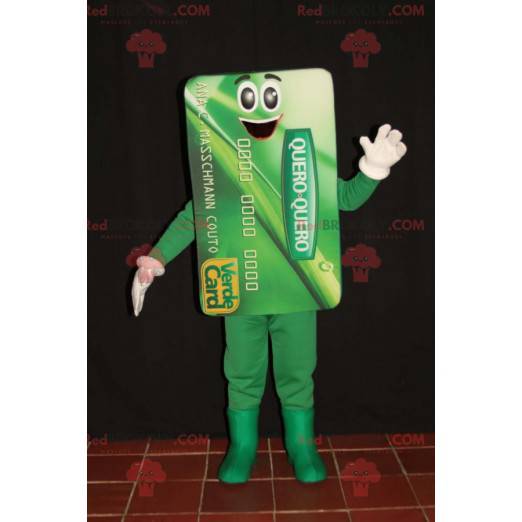 Mascote gigante do cartão de banco verde. Cartão azul -