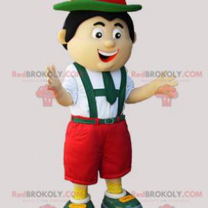 Tiroler mascotte in traditionele groene, rode en witte kleding