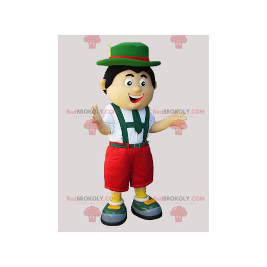 Tyrolean mascot in traditional green red and white dress -