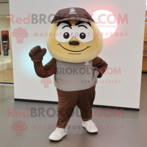 Brown Engagement Ring mascot costume character dressed with a Joggers and Clutch bags