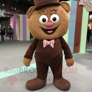 Brown Candy mascot costume character dressed with a Corduroy Pants and Ties