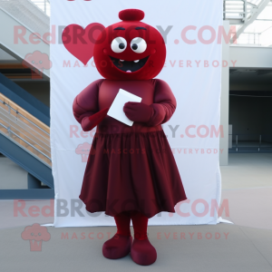 Maroon Love Letter mascot costume character dressed with a Empire Waist Dress and Foot pads