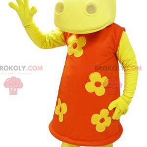 Mascote hipopótamo amarelo com vestido floral laranja -