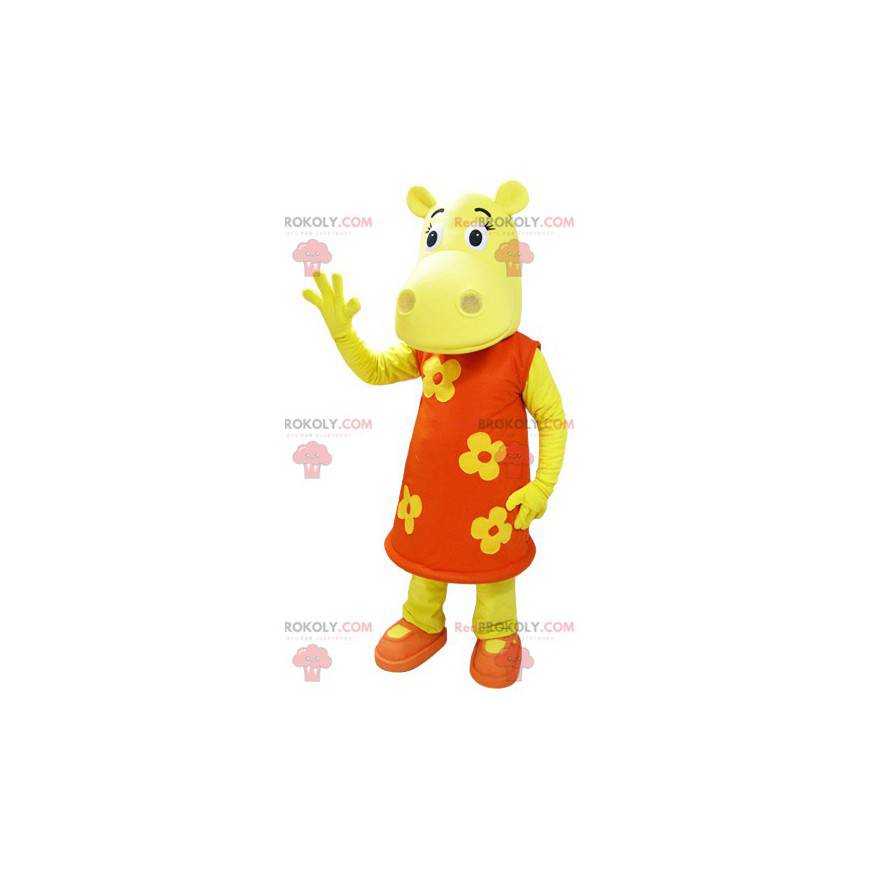 Mascotte d'hippopotame jaune habillé d'une robe fleurie orange