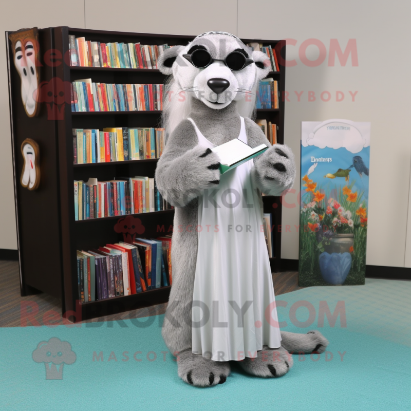 Silver Otter mascot costume character dressed with a Maxi Skirt and Reading glasses