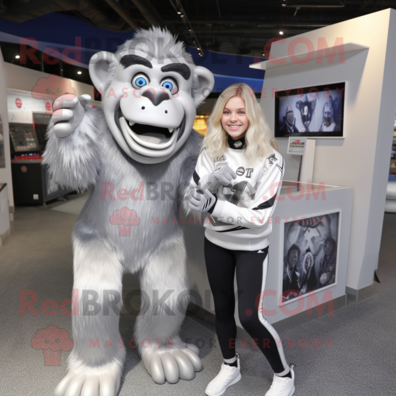 Silver Chimpanzee mascot costume character dressed with a Mini Skirt and Mittens Silver Chimpanzee mascot costume character dressed with a Mini Skirt and Mittens