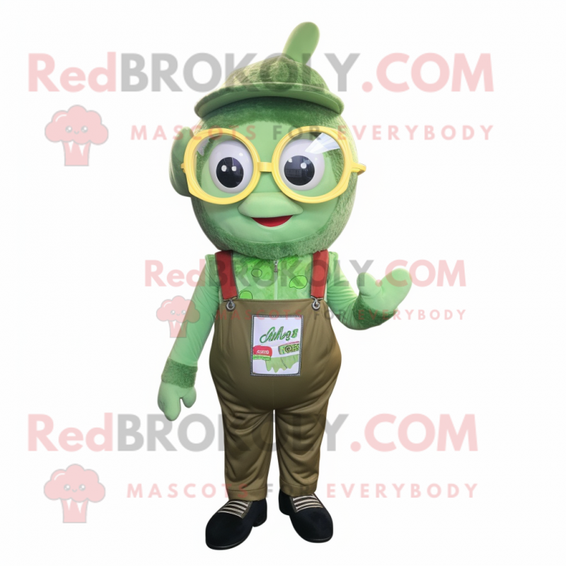 Olive Candy mascot costume character dressed with a Dungarees and Reading glasses Olive Candy mascot costume character dressed with a Dungarees and Reading glasses