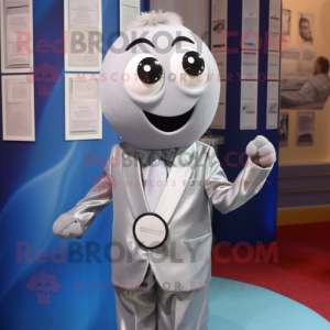Silver But mascot costume character dressed with a Mini Dress and Tie pins