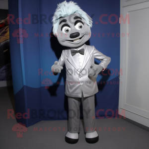 Silver But mascot costume character dressed with a Mini Dress and Tie pins