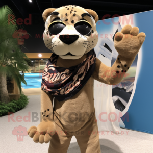 Tan Panther mascot costume character dressed with a Board Shorts and Scarves