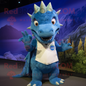 Blue Stegosaurus mascot costume character dressed with a Henley Tee and Lapel pins