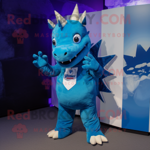 Blue Stegosaurus mascot costume character dressed with a Henley Tee and Lapel pins