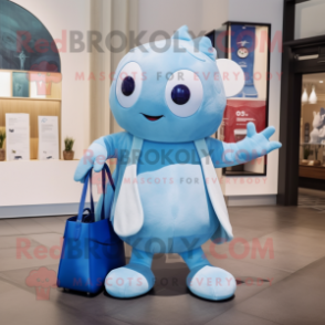 Sky Blue Stingray mascot costume character dressed with a Henley Tee and Handbags