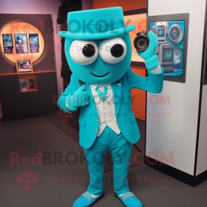 Turquoise Camera mascot costume character dressed with a Blazer and Digital watches