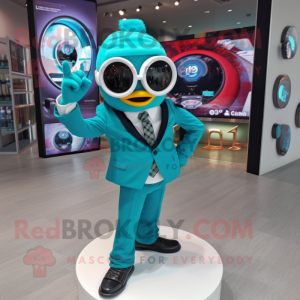 Turquoise Camera mascot costume character dressed with a Blazer and Digital watches