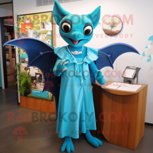 Turquoise Bat mascot costume character dressed with a Maxi Dress and Tie pins