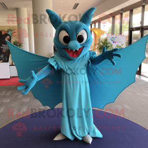 Turquoise Bat mascot costume character dressed with a Maxi Dress and Tie pins