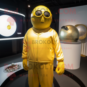 Gold Golf Ball mascot costume character dressed with a Sweatshirt and Cummerbunds
