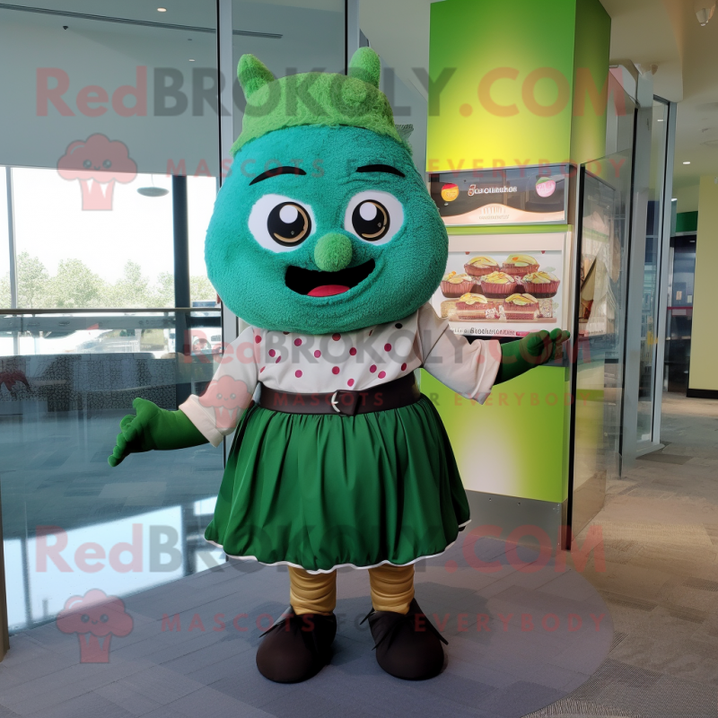 Forest Green Cupcake mascot costume character dressed with a Wrap Skirt and Suspenders