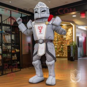 Gray Medieval Knight mascot costume character dressed with a Joggers and Messenger bags